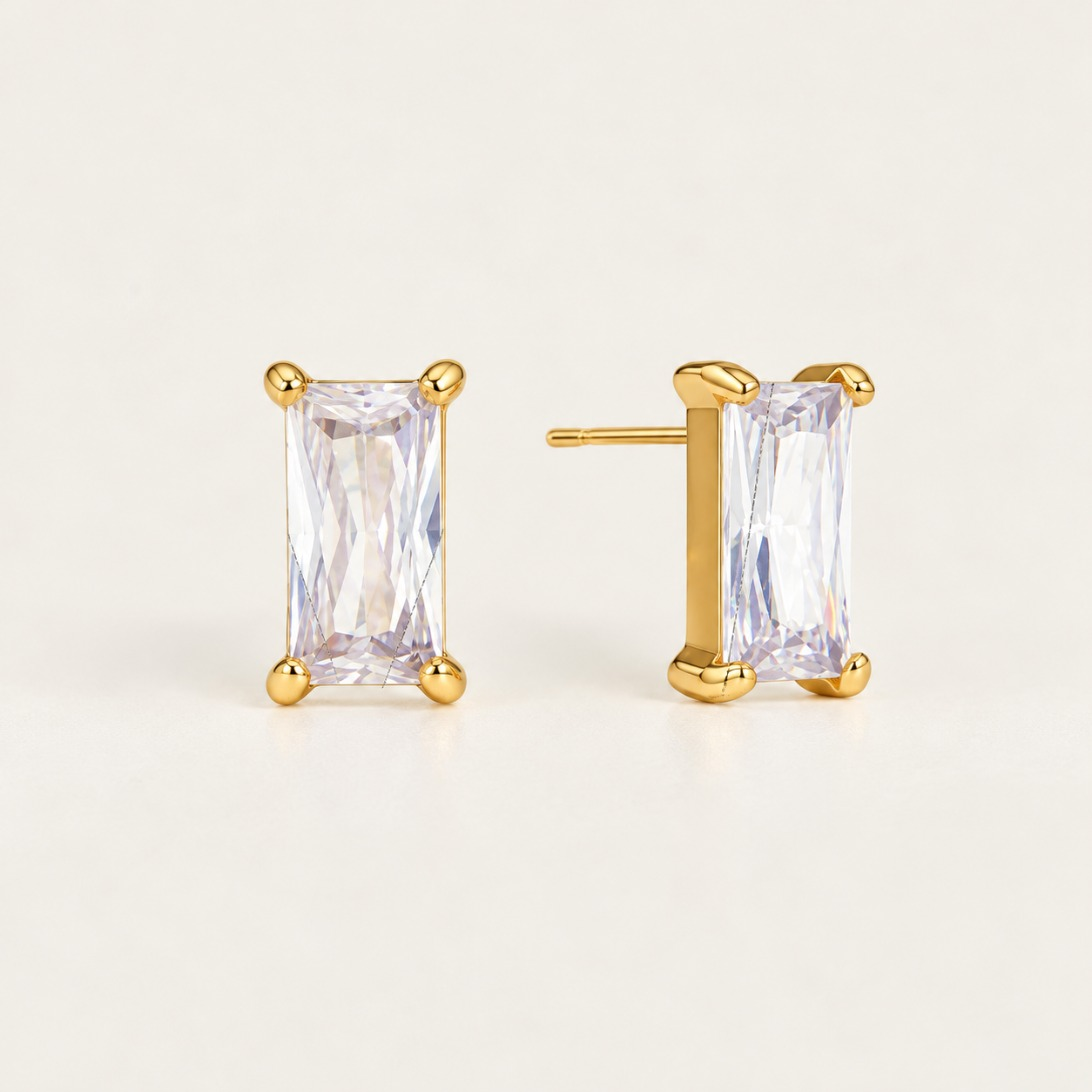 Gold Bagatelle EARRINGS: emerald-cut baguette zirconia studs in a four-prong gold setting — Folie à Trois wholesale
