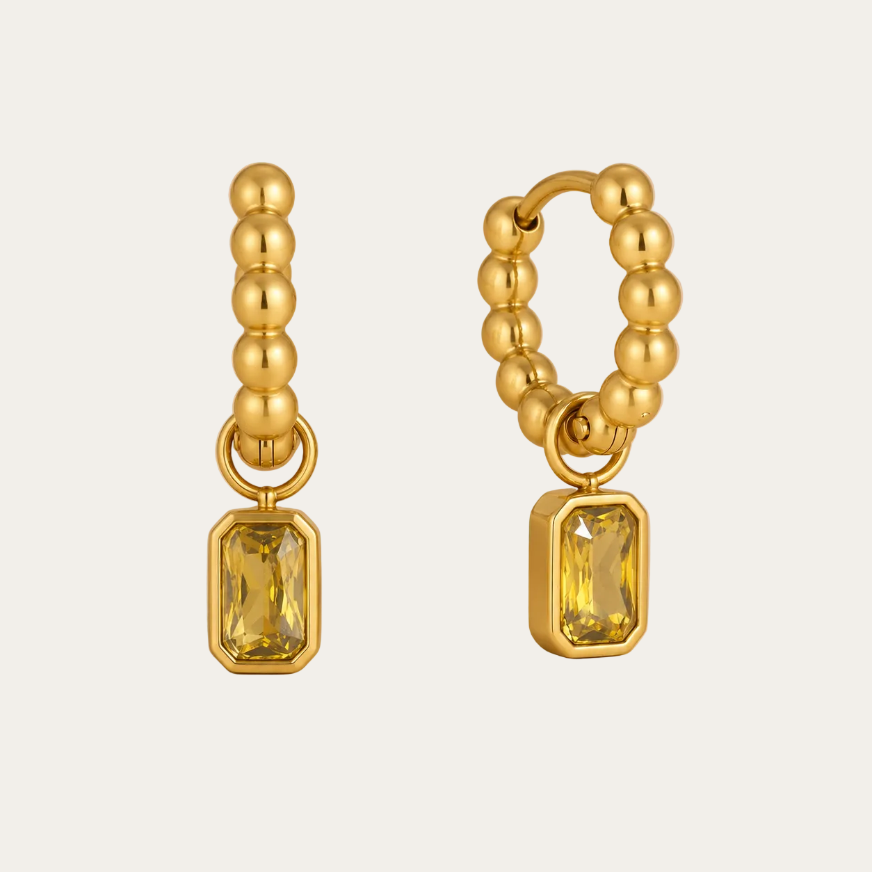 Gold beaded hoop earring with a dangling emerald-cut yellow zirconia charm — Folie à Trois Costa EARRINGS.