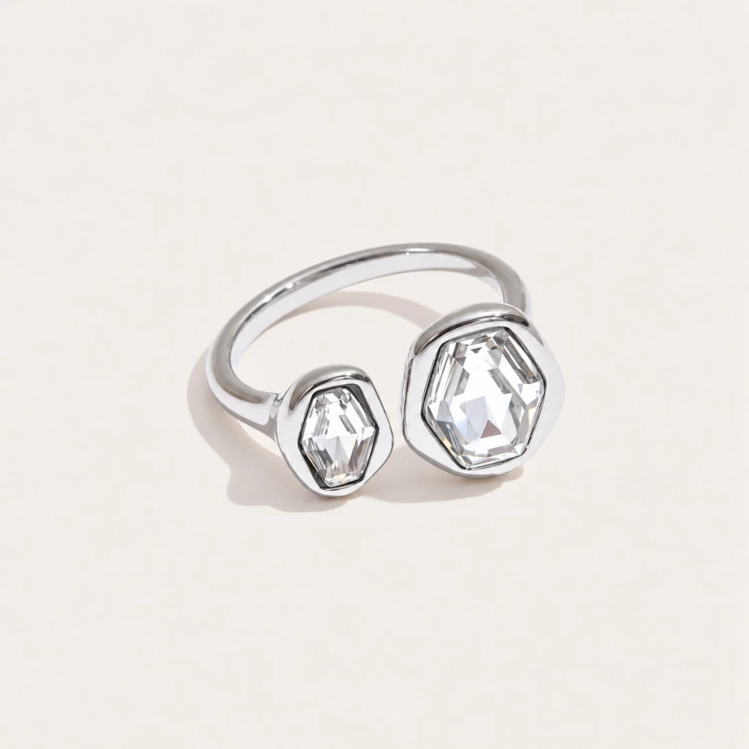 Silver-tone Roche RING: an irregular, sculpted open band wrapped around a round white zirconia — Folie à Trois