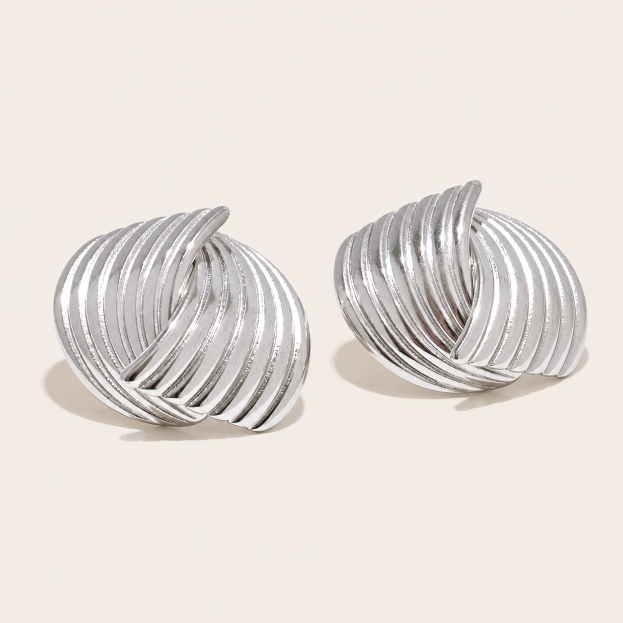 Sun Society Gold and Silver Stud Earrings on Model – Folie à Trois