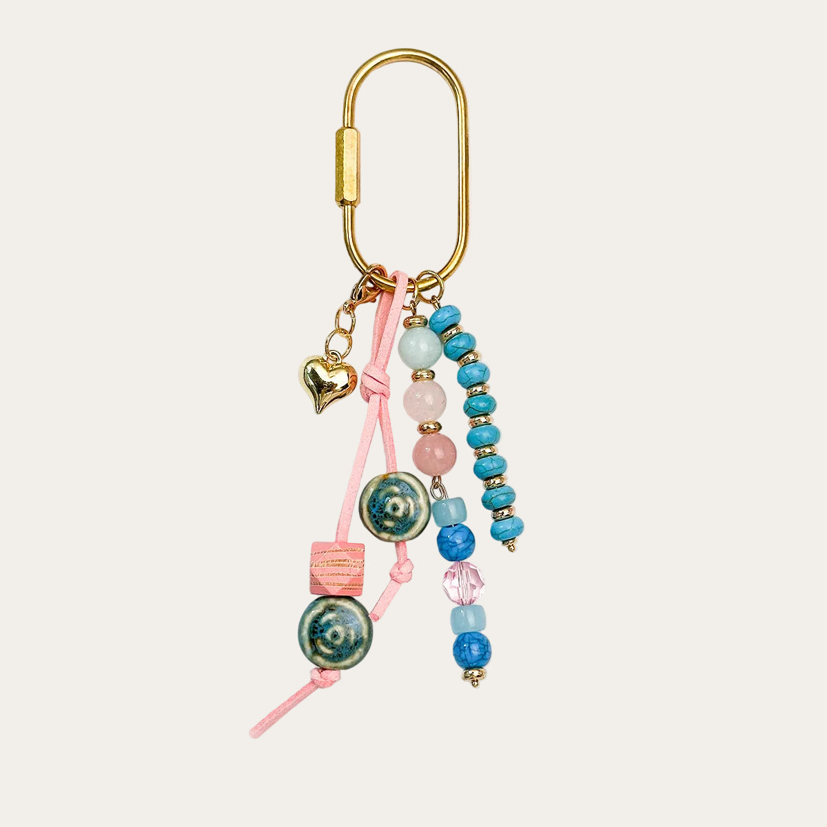 Bahia BAG CHARM Lagoon - pastel blue and pink beaded tassel with heart charm
