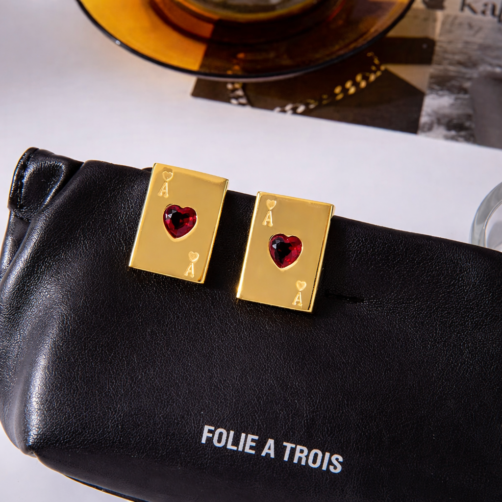 Pair of gold-plated Ace of Hearts stud earrings with rectangular card design and red heart-shaped gemstones