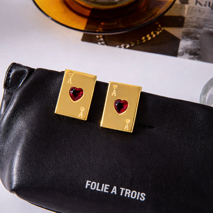 Pair of gold-plated Ace of Hearts stud earrings with rectangular card design and red heart-shaped gemstones