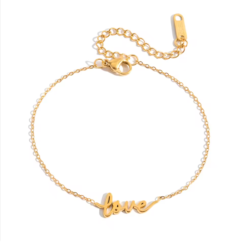 Gold-plated bracelet with a delicate chain and “love” script charm