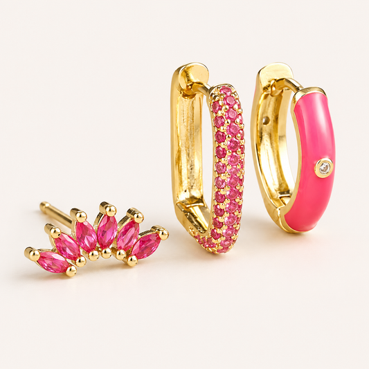 Three-piece Ames SET gold earrings in pink: a marquise ear climber, a pave hoop, and a pink enamel hoop with a bezel-set stone accent.