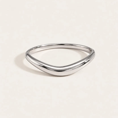 Silver-tone Arco BRACELET: a slim, polished bangle with a soft curved arch — Folie à Trois wholesale jewelry