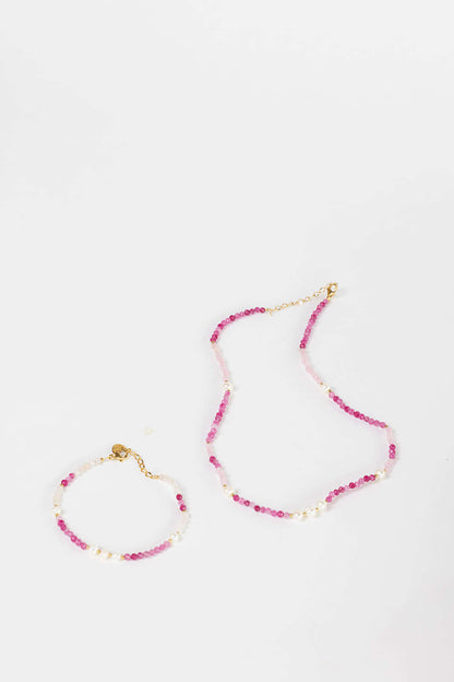 Bianca BRACELET pink and white beaded bracelet with pearl accents, shown beside the matching necklace on white.