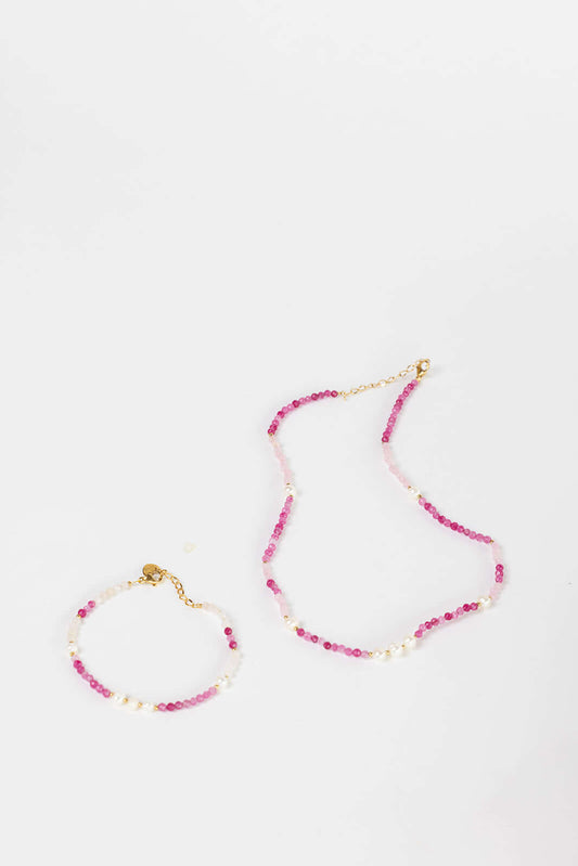 Bianca BRACELET pink and white beaded bracelet with pearl accents, shown beside the matching necklace on white.