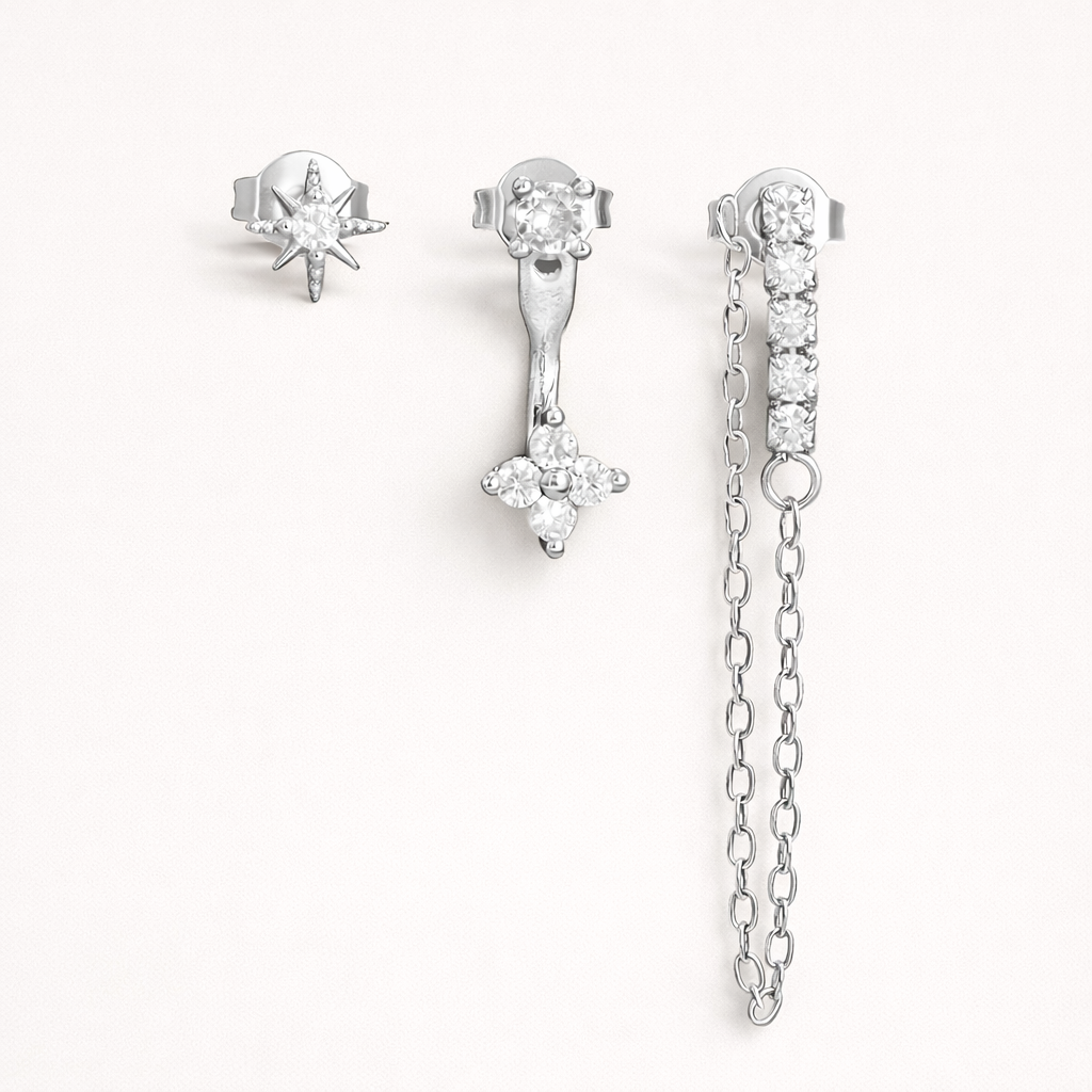 Bianca Set in silver tone, showing the same star stud, flower drop, and crystal bar with chain detail.