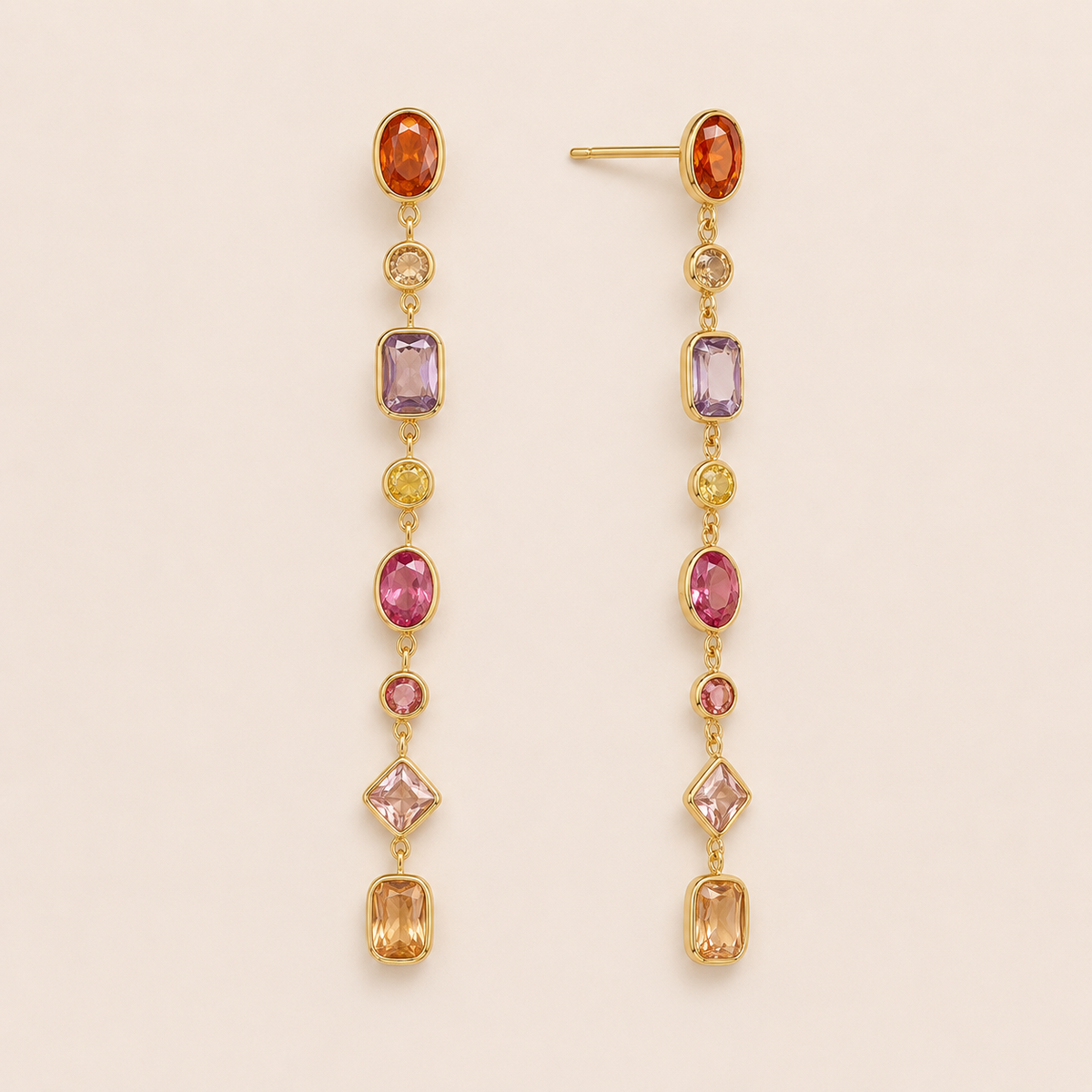 Gold linear drop earring with a graduated row of multicolor oval and emerald-cut gemstones — Folie à Trois Brise EARRINGS.