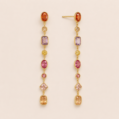 Gold linear drop earring with a graduated row of multicolor oval and emerald-cut gemstones — Folie à Trois Brise EARRINGS.