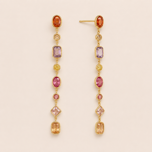 Gold linear drop earring with a graduated row of multicolor oval and emerald-cut gemstones — Folie à Trois Brise EARRINGS.