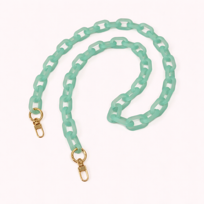Mint green frosted acrylic Bubble Links phone chain coiled flat with gold-tone clasp hardware.