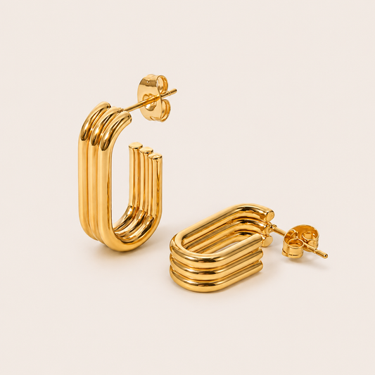Gold Cami EARRINGS square-shaped hoops made of multiple stacked ridged bands in a rounded rectangular silhouette.
