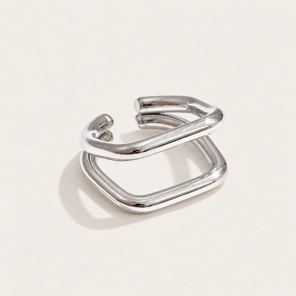 Silver-tone Carré RING: a thick, rounded band shaped into an open square with soft corners — Folie à Trois