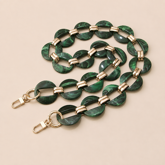 Malachite green resin link phone chain with gold connectors coiled on cream — Folie à Trois Cedar wholesale phone chain
