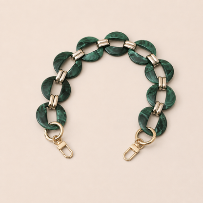 Round malachite green resin link phone chain with gold connectors on cream — Folie à Trois Cedar wholesale phone chain