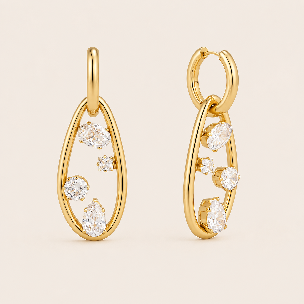 Gold teardrop link drop earring scattered with round and marquise-cut white zirconia stones — Folie à Trois Celia EARRINGS.