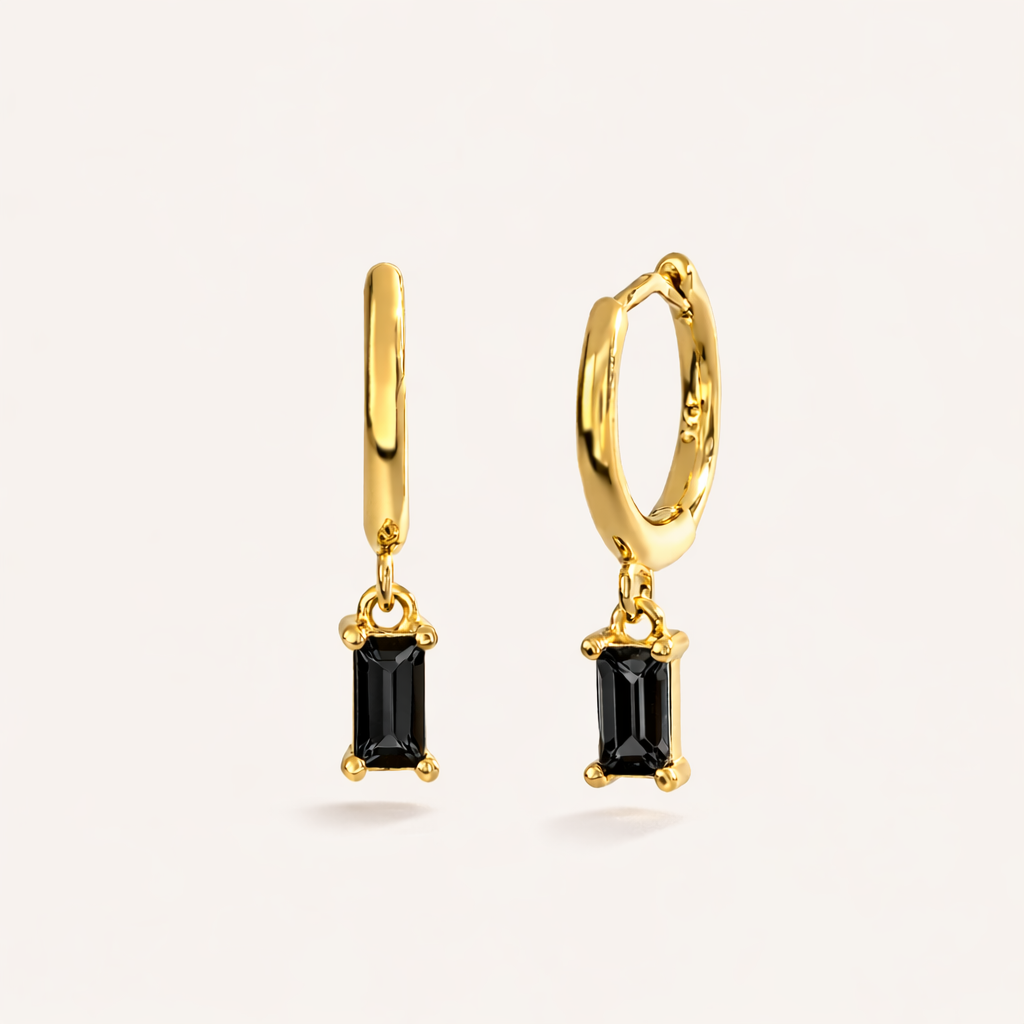Classic Drop Earrings in gold with black crystals, showing the smooth hoop and baguette-cut crystal drop.