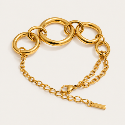 Gold chunky circular-link bracelet with an adjustable chain extender, product shot for the Folie à Trois Cluster BRACELET.