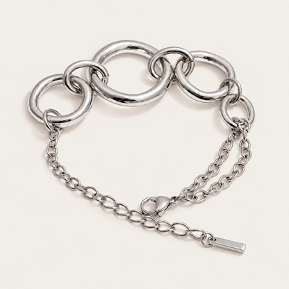 Silver chunky circular-link bracelet with an adjustable chain extender, product shot for the Folie à Trois Cluster BRACELET.