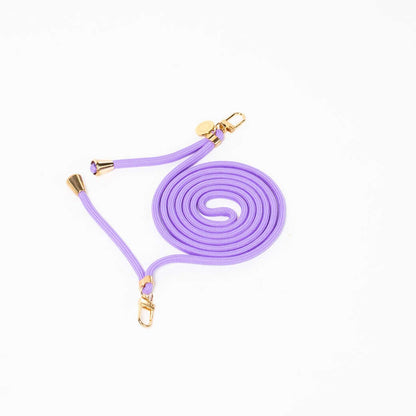 Lavender Colorful PHONE CORD coiled with gold-tone hardware on a white background.