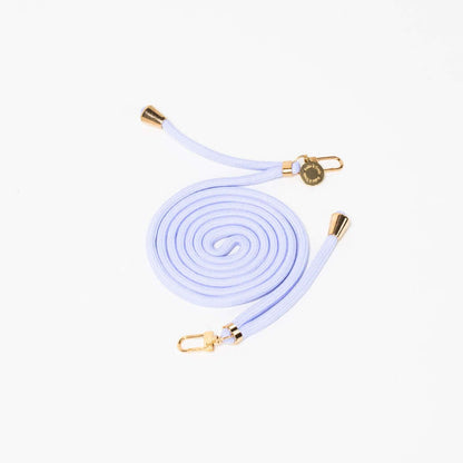 Pale periwinkle Colorful PHONE CORD coiled with gold-tone hardware on a white background.
