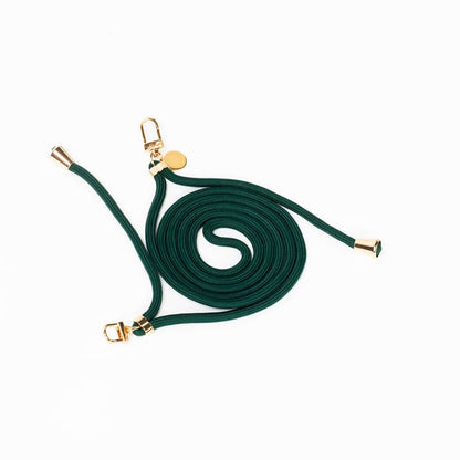 Dark forest green Colorful PHONE CORD coiled with gold-tone hardware on a white background.