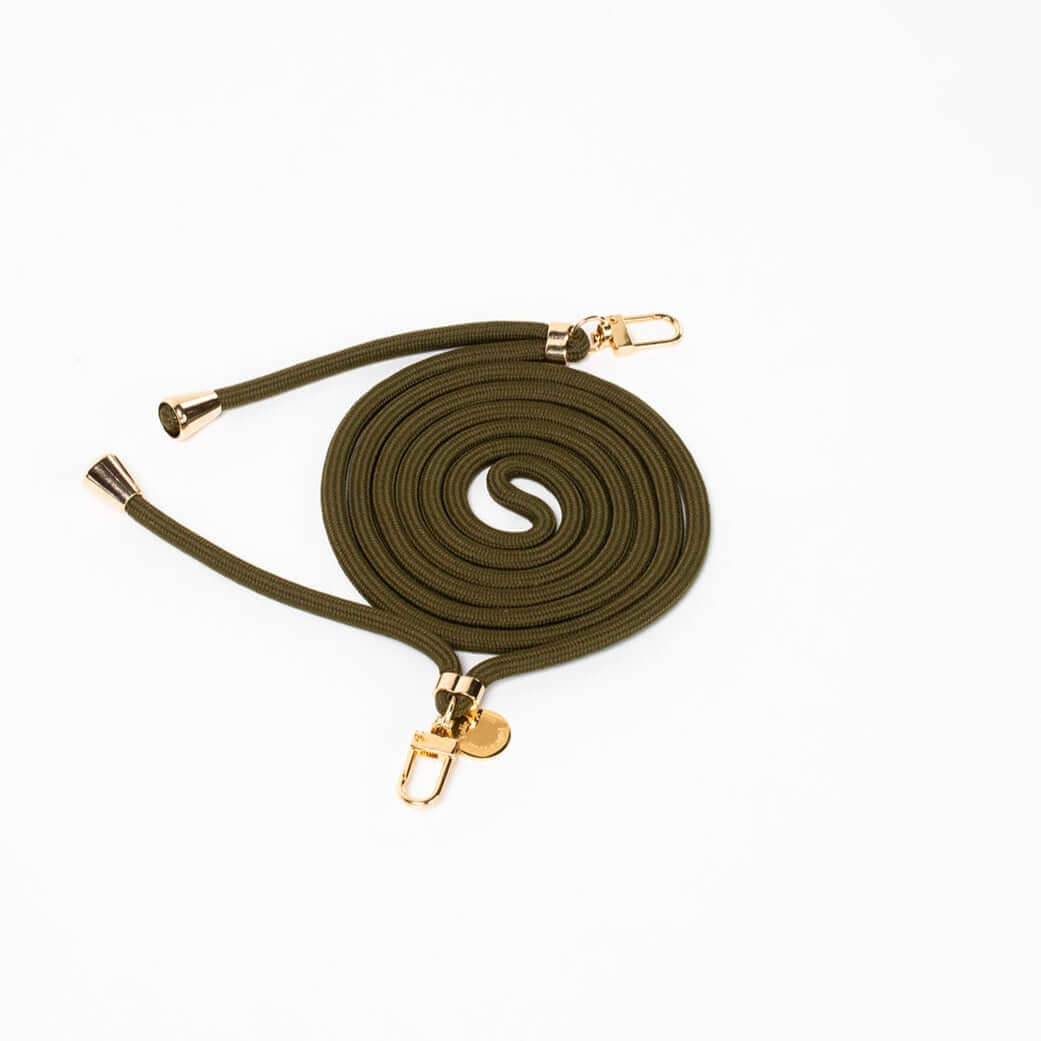Olive green Colorful PHONE CORD coiled with gold-tone hardware on a white background.