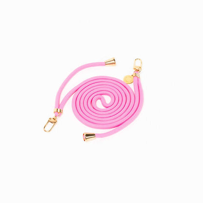 Bubblegum pink Colorful PHONE CORD coiled with gold-tone hardware on a white background.