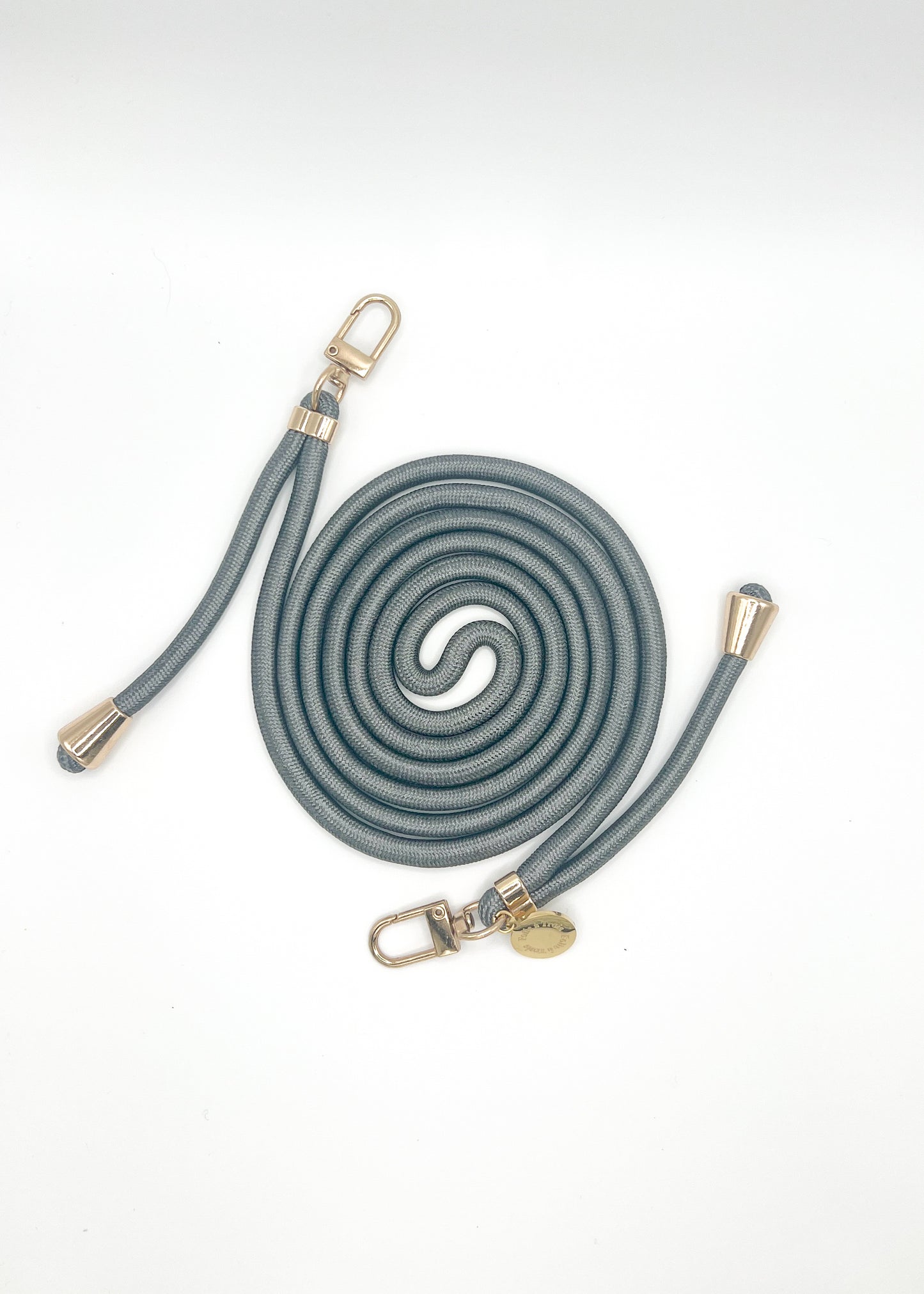 Gray-blue Colorful PHONE CORD coiled with gold-tone hardware on a white background.
