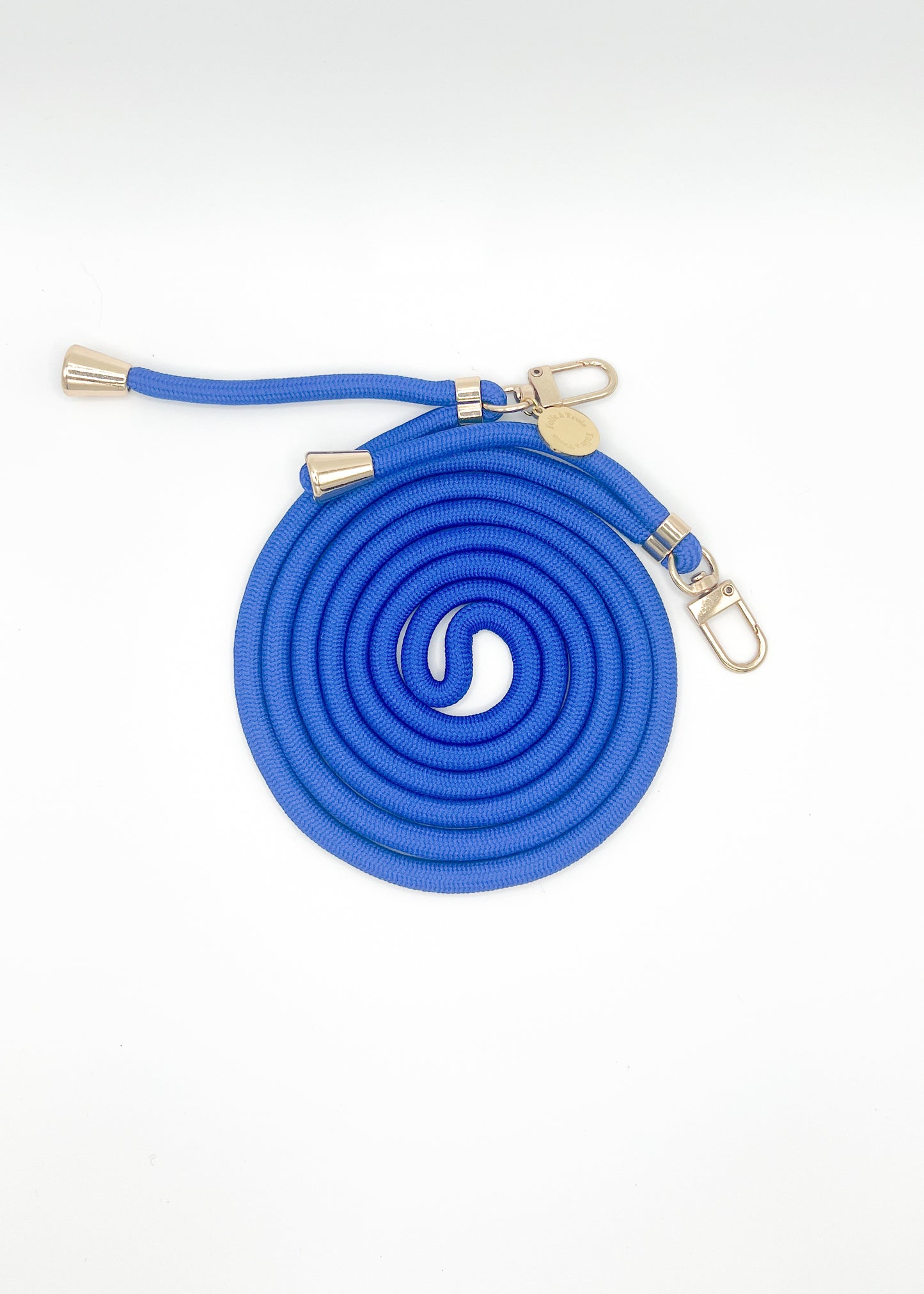 Blue Colorful PHONE CORD coiled with silver-tone hardware on a white background.