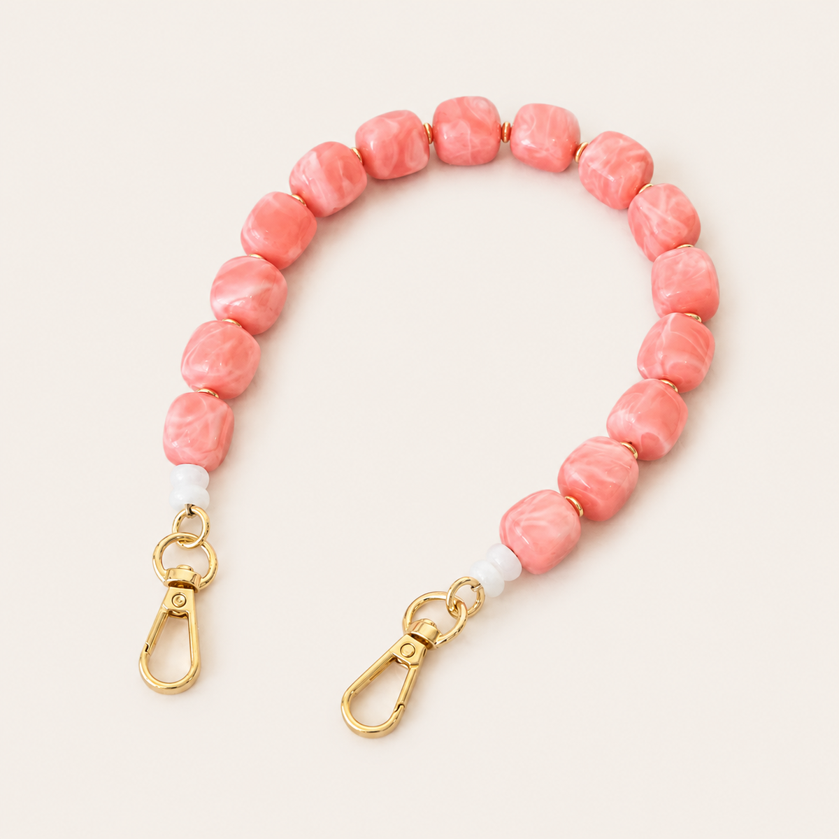 Coral pink marbled beaded phone chain with cube beads and gold clasps — Folie à Trois Cora wholesale phone accessory