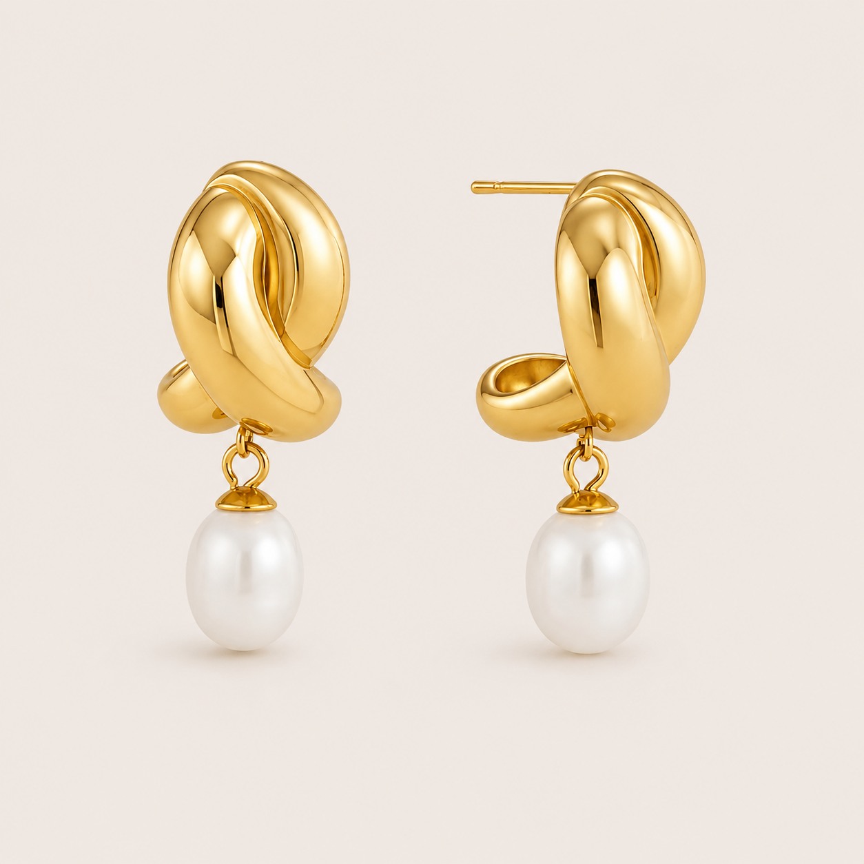 Gold twisted knot stud earring with a dangling round white pearl drop — Folie à Trois Cruz EARRINGS.