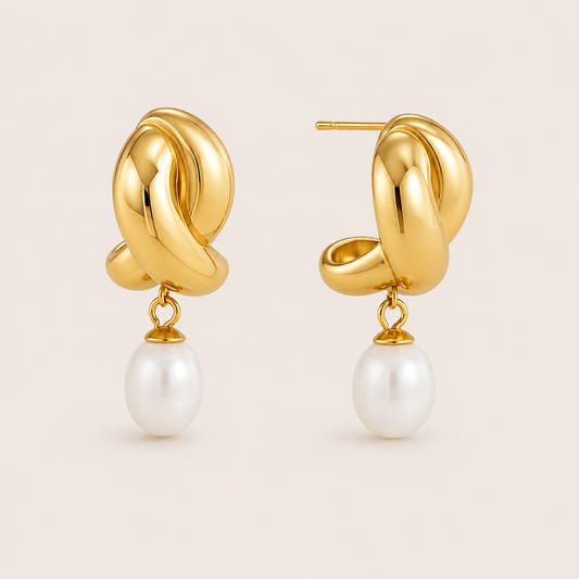 Gold twisted knot stud earring with a dangling round white pearl drop — Folie à Trois Cruz EARRINGS.