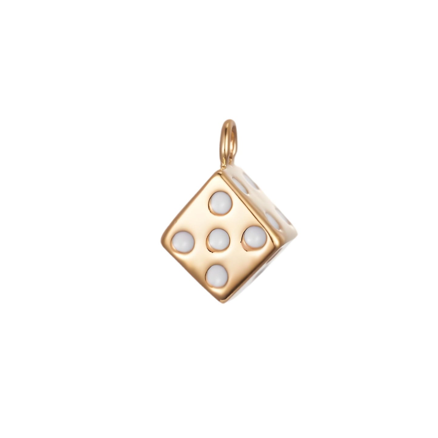 The Dice CHARM in gold, a cube-shaped pendant set with white enamel pips, shown in close-up studio photography on white.