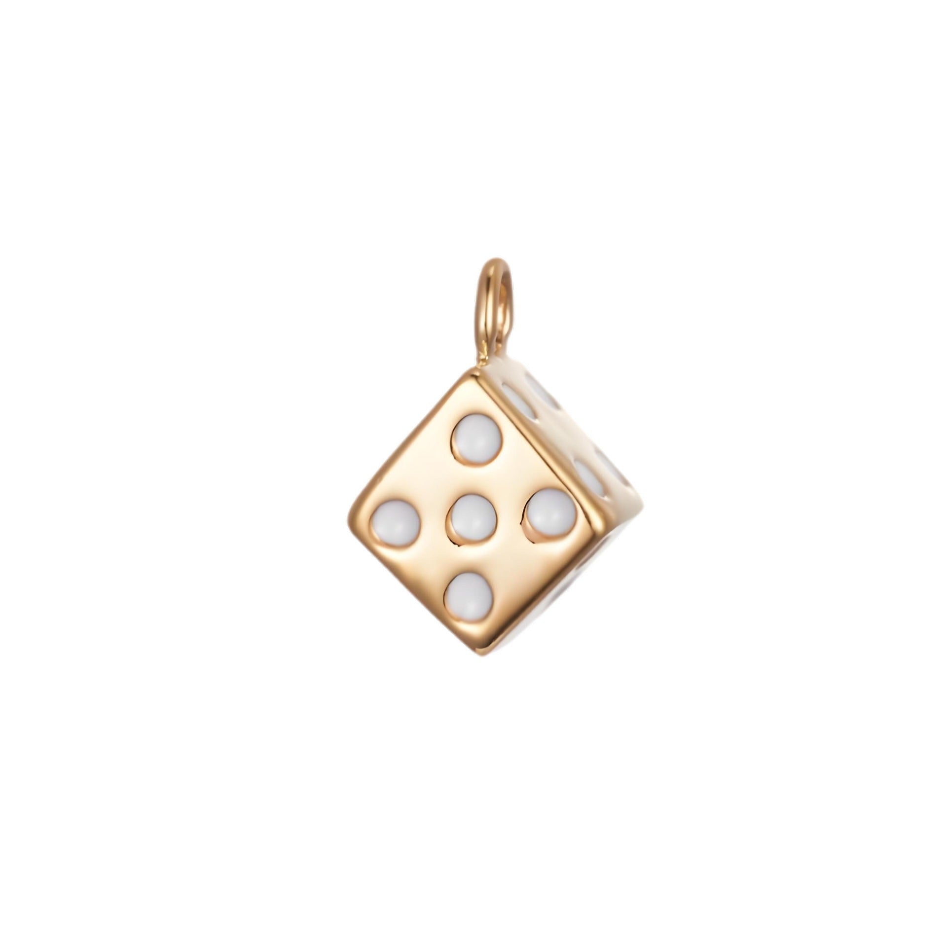 The Dice CHARM in gold, a cube-shaped pendant set with white enamel pips, shown in close-up studio photography on white.