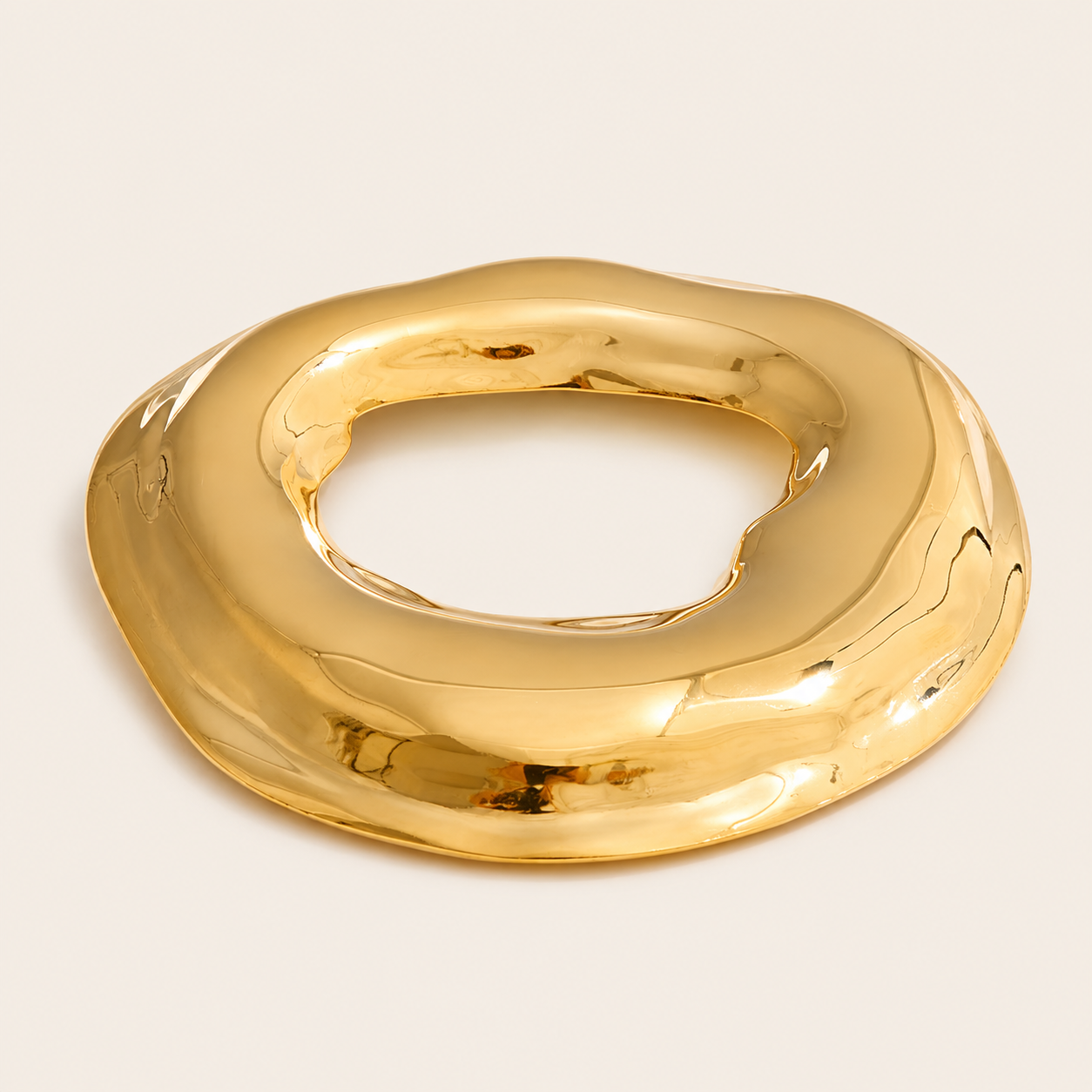 Gold molten organic-shaped ring brooch, large size, on a cream backdrop — Folie à Trois Duna BROOCH