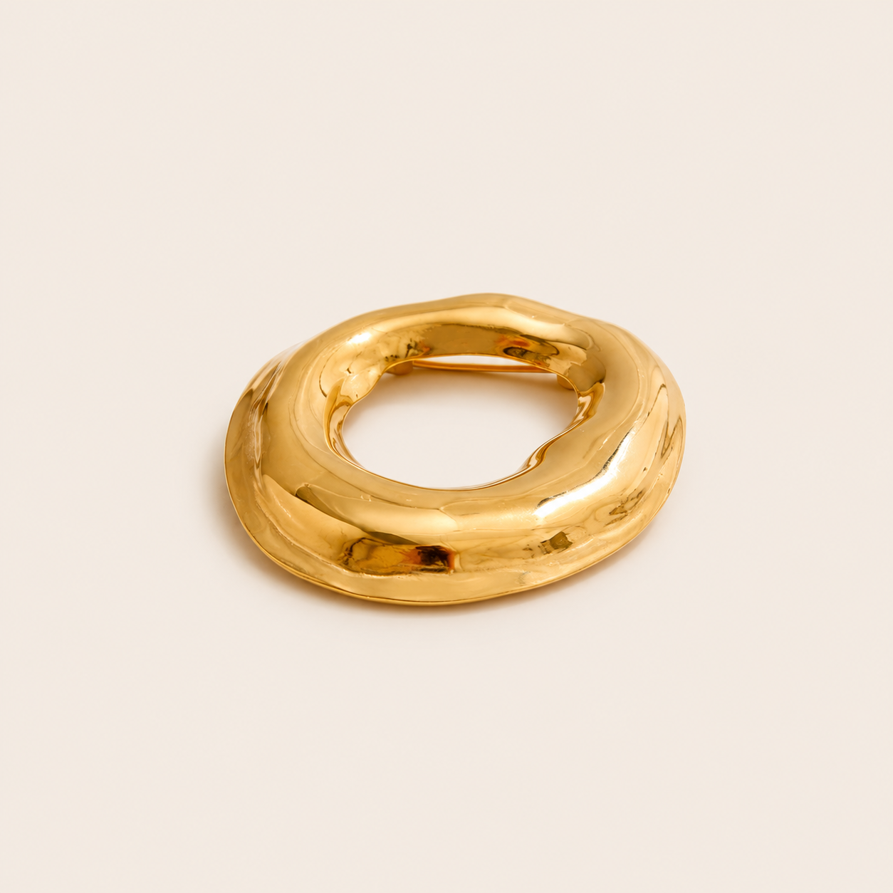 Gold molten organic-shaped ring brooch, small size, on a cream backdrop — Folie à Trois Duna BROOCH