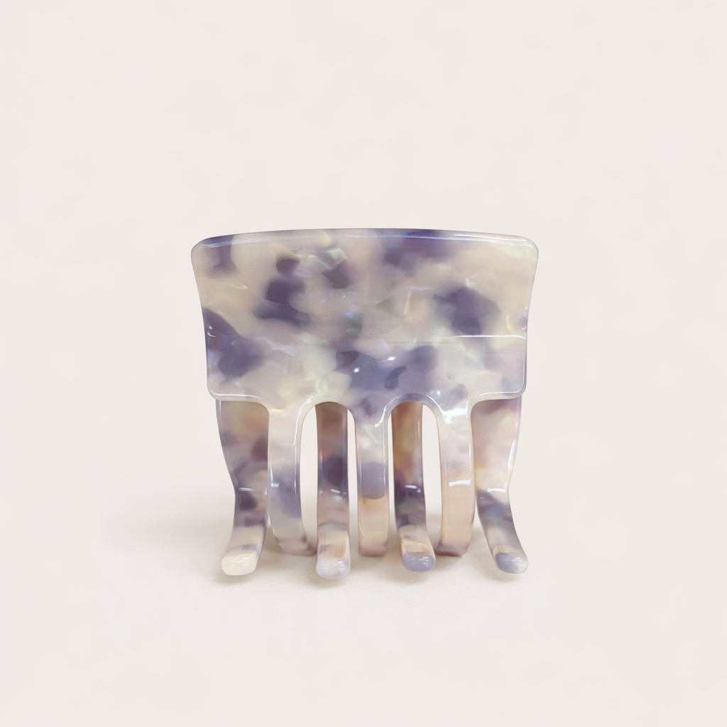 Enchanted Garden HAIR CLIP square acetate claw clip in a blue, purple and cream marbled pattern, studio shot.