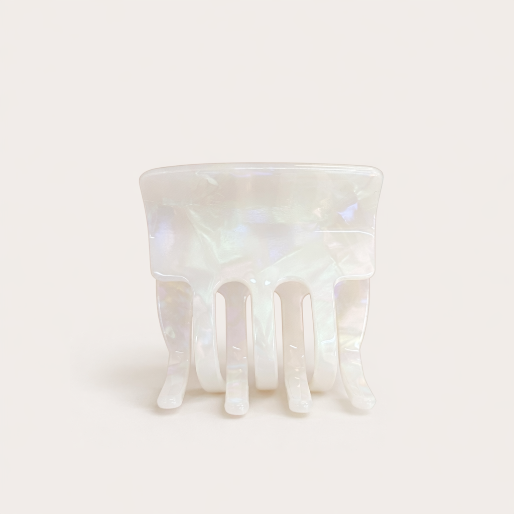 Enchanted Garden HAIR CLIP square acetate claw clip in a solid iridescent white shade, studio shot.
