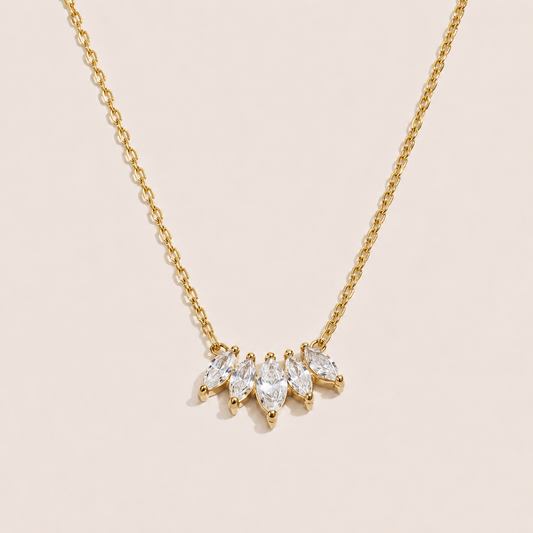 Gold pendant necklace with five marquise-cut white zirconia stones fanned along a fine chain — Folie à Trois Facet NECKLACE
