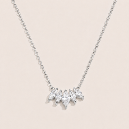 Silver pendant necklace with five marquise-cut white zirconia stones fanned along a fine chain — Folie à Trois Facet NECKLACE