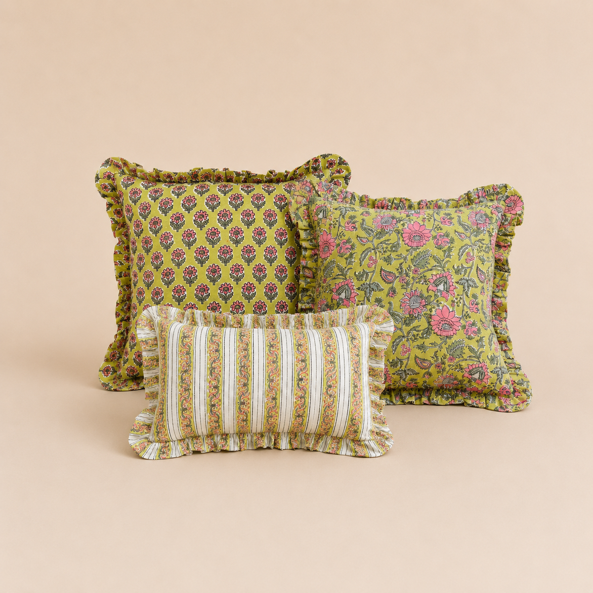Fern Sage Green Cushion SET featuring three ruffled cushions in olive green with pink floral and striped block-print patterns, grouped together.