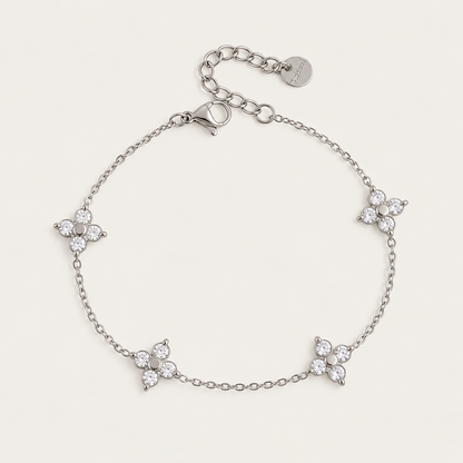 Silver-tone Fiore BRACELET: fine chain with four zirconia flower stations and an extender chain — Folie à Trois