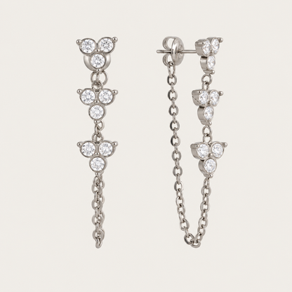 Silver-tone Fiore EARRINGS: drops of three zirconia trefoil clusters with a fine front-to-back chain — Folie à Trois