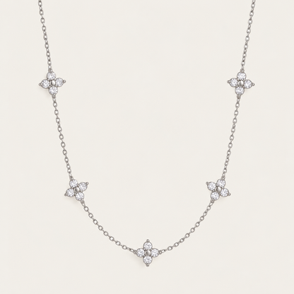 Silver-tone Fiore NECKLACE: delicate chain with five sparkling zirconia flower stations — Folie à Trois wholesale