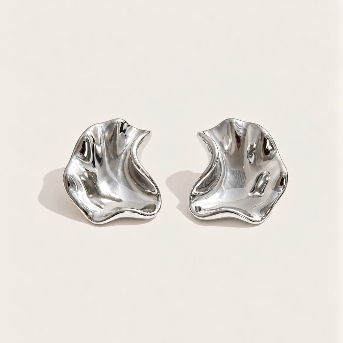 Silver-tone Fondu EARRINGS: a pair of irregular, wavy stud earrings with a high-shine molten-metal finish — Folie à Trois