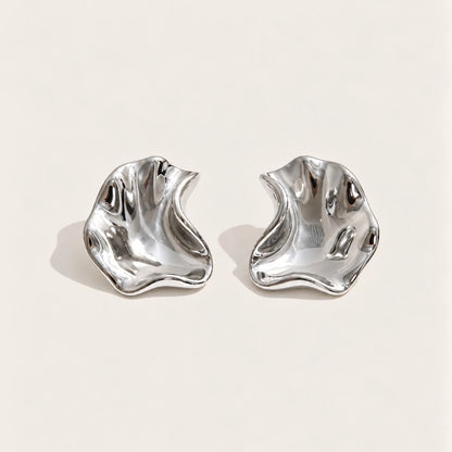 Silver-tone Fondu EARRINGS: a pair of irregular, wavy stud earrings with a high-shine molten-metal finish — Folie à Trois