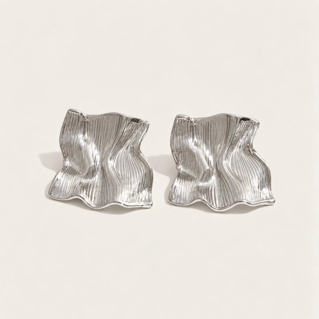 Silver-tone Froissé EARRINGS: a pair of chunky square earrings with a softly crumpled, textured surface — Folie à Trois